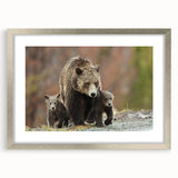 Textured art print of the Grand Tetons with abstract elements, in a silver frame, suitable for bedroom decor.