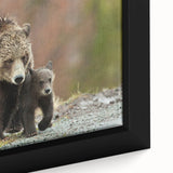 Close-up of a framed canvas featuring a textured depiction of the Grand Tetons in black with colorful accents.