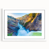 Abstract art print of Yellowstone scenery in muted earth tones on a white framed mat.