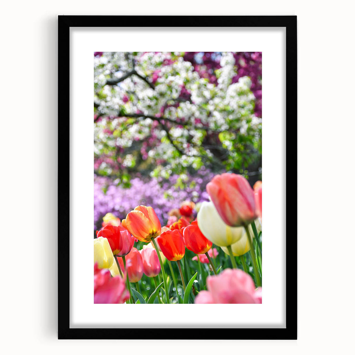 Abstract art print featuring textured, colorful swirls on a large canvas, framed in black, ideal for living room decor.