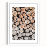 Abstract art print depicting a winter scene in muted blue and white tones on a framed canvas.