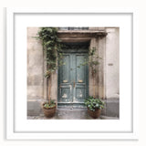 Abstract art print of a stylized French door in muted gray tones on a white framed poster, suited for dining room decor.