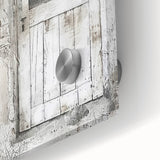 Close-up of a rustic Italian door depicted in mid-century modernist style on large acrylic glass, ideal for dining room art.