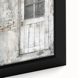 Close-up of a rustic Italian door depicted in textured black wall art on a framed canvas, featuring colorful accents.