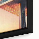 Close-up of a black wall art on framed canvas featuring a colorful, textured abstract design.