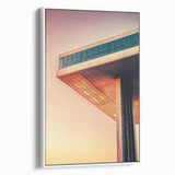 Vintage poster art of architectural design in black and colorful tones on a large framed canvas.