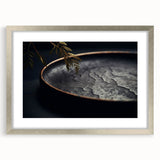 Textured abstract art print in silver and gray tones, framed with a mat, ideal for modern bedroom decor.