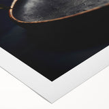 Art deco poster featuring geometric patterns in muted gold and black on rolled canvas.