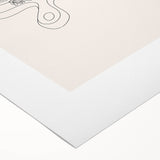 Art deco poster featuring a geometric pattern in black and gold on a rolled canvas.