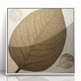 Framed wall art featuring a vibrant floral design with green leaves and colorful blooms, set in a sleek white frame, perfect for home decor.