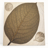 Vibrant wall art canvas featuring a floral design with colorful flowers and green leaves, elegantly leaning against a neutral wall, perfect for home decor.