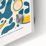 Close-up of large abstract wall art featuring assorted fruits in vibrant colors on acrylic glass.