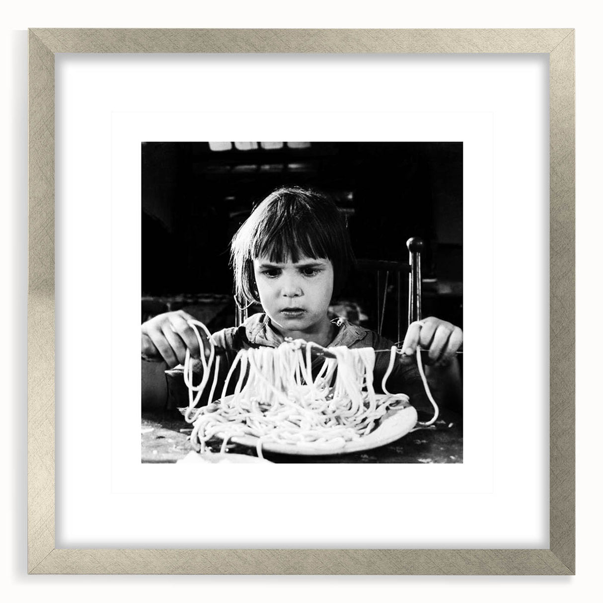 Textured abstract art print featuring people and food motifs in muted colors, framed in silver, ideal for bedroom wall decor.