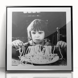 Large abstract wall art featuring indistinct figures in black and white, framed in acrylic.