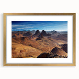 Textured abstract art print depicting a serene Algerian landscape in earthy tones, framed in gold, ideal for bedroom art.