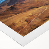 Art deco poster featuring a serene Algerian landscape on rolled canvas, in muted earth tones, ideal for dining room decor.