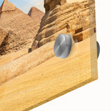 Large abstract depiction of Egyptian scenery in earth tones on acrylic glass, suitable for dining room art.