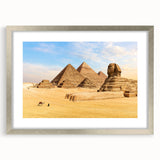 Abstract art print of an Egyptian landscape in muted earth tones on a framed silver canvas, suitable for dining room decor.
