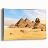 Vintage poster art of an Egyptian landscape on a large framed canvas, featuring a black and colorful palette.
