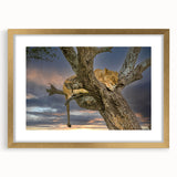 Textured abstract art print depicting a Kenyan landscape in earth tones, framed in gold, suitable for bedroom decor.