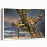 Framed canvas featuring a Kenyan landscape with acacia trees under a sunset sky, in muted earth tones.