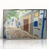 Mid-century modernist art depicting a Tunisian landscape in muted earth tones on a framed acrylic print.