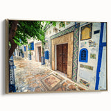 Framed canvas depicting a vintage-style Tunisian landscape in gold and black tones, ideal for bedroom wall art.