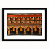 Extra large framed abstract art print featuring a colorful, textured depiction of a Bhutanese landscape.