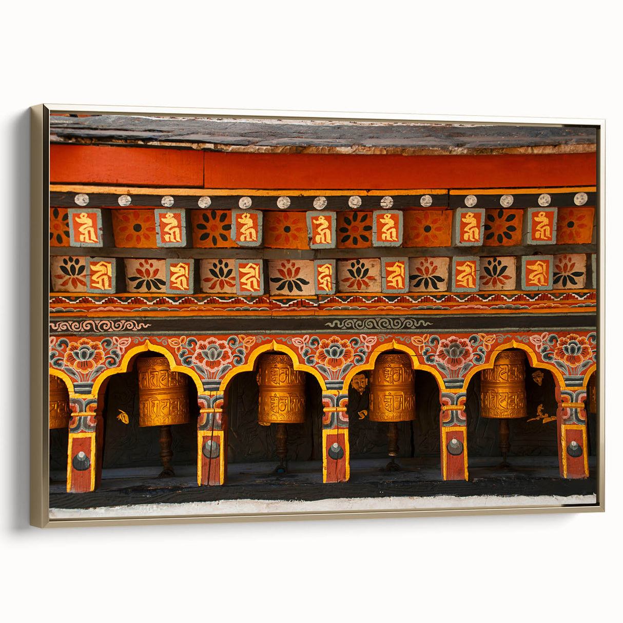 Framed canvas of a vintage-style Bhutan landscape painting in muted gold and black, ideal for bedroom wall art.