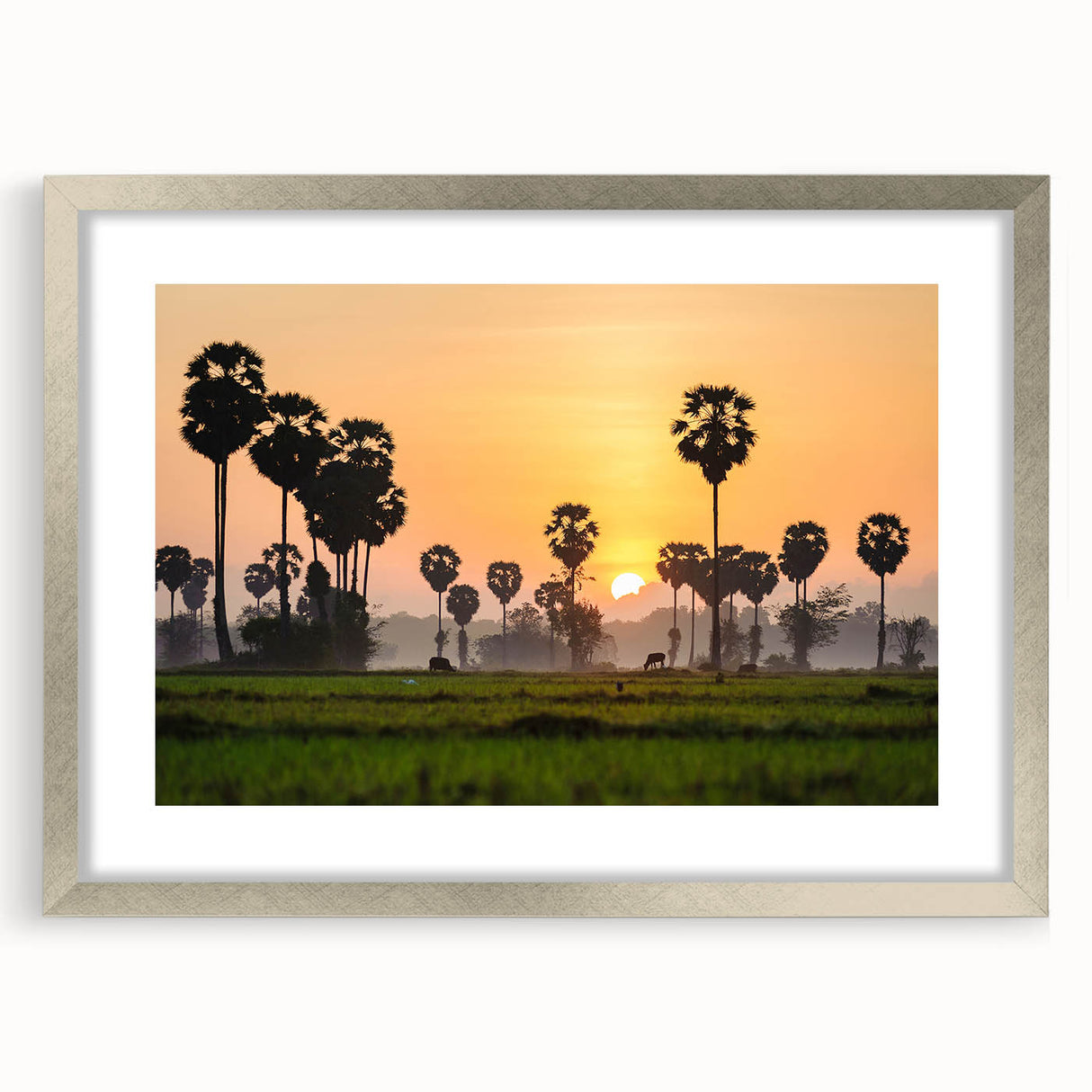 Textured abstract art print of a Cambodian landscape in muted earth tones, framed with a silver mat.