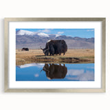 Textured art depicting abstract Tibetan landscape in muted earth tones on a framed silver mat, suitable for bedroom decor.