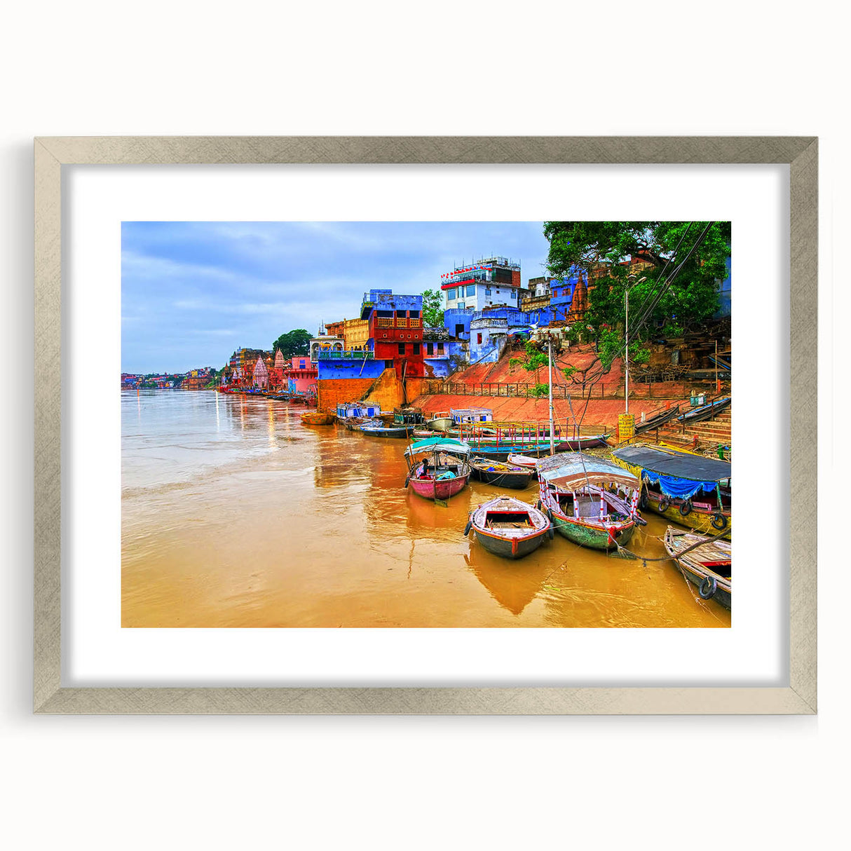 Textured abstract art print of an Indian landscape in muted earth tones on a framed canvas, suitable for bedroom decor.