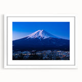 Abstract art print of a serene Japanese landscape in muted green and blue tones, framed with a white mat.