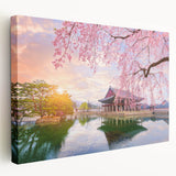 Large wall art on stretched canvas depicting a serene Korean landscape in soft green and blue tones.