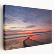 Side view of a large stretched canvas depicting a Malaysian landscape in vibrant green and blue tones.