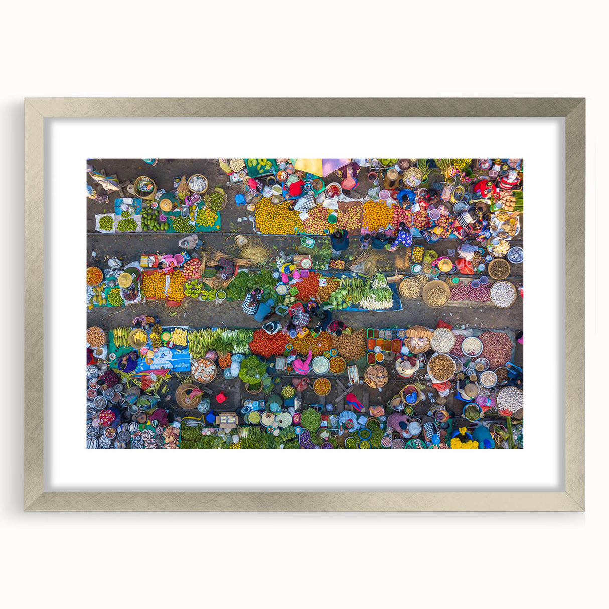 Textured art print of an abstract Myanmar landscape in muted earth tones, framed in silver, ideal for bedroom decor.