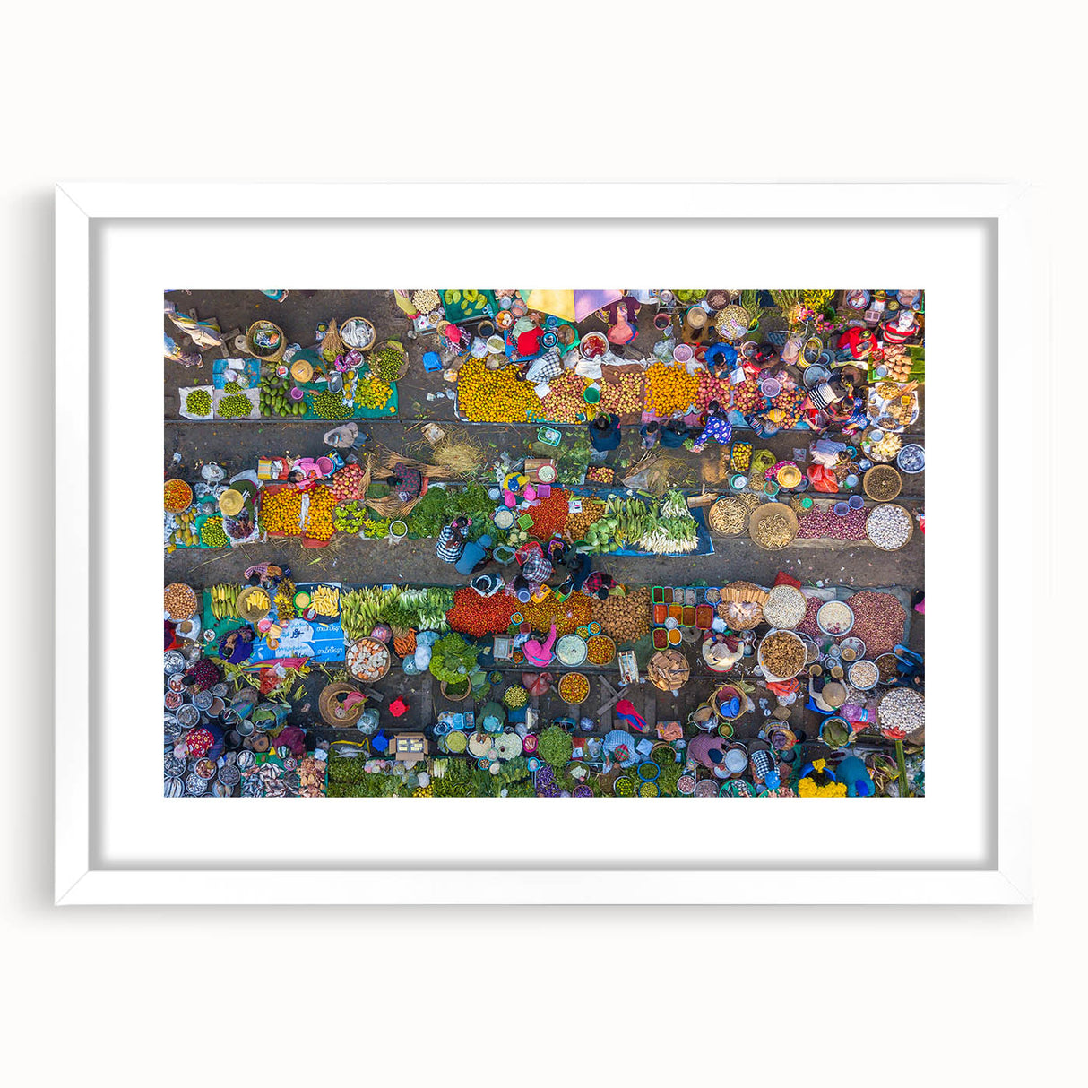 Abstract art print of a Myanmar landscape in muted earth tones on a framed white mat, ideal for dining room decor.