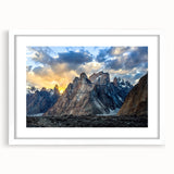 Abstract art print of a cascading mountain scene in cool blue and white tones, framed with a white mat.