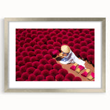 Textured art depicting an abstract Vietnamese landscape in muted earth tones on a framed silver mat.