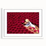 Abstract art print of a Vietnam landscape in muted green and brown tones on a framed white mat, ideal for dining room decor.