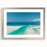 Abstract art print of the Great Barrier Reef in blue and green tones, framed in silver.