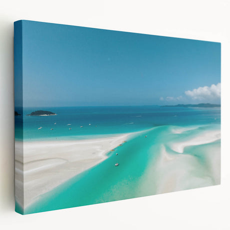 Side view of a stretched canvas depicting the Great Barrier Reef in vibrant blue and green tones.