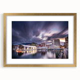 Abstract art print of Tasmania scenery in muted earth tones, framed in gold, ideal for dining room decor.