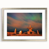 Textured abstract art print of Manitoba scenery in muted earth tones, framed with a silver mat, suitable for bedroom decor.