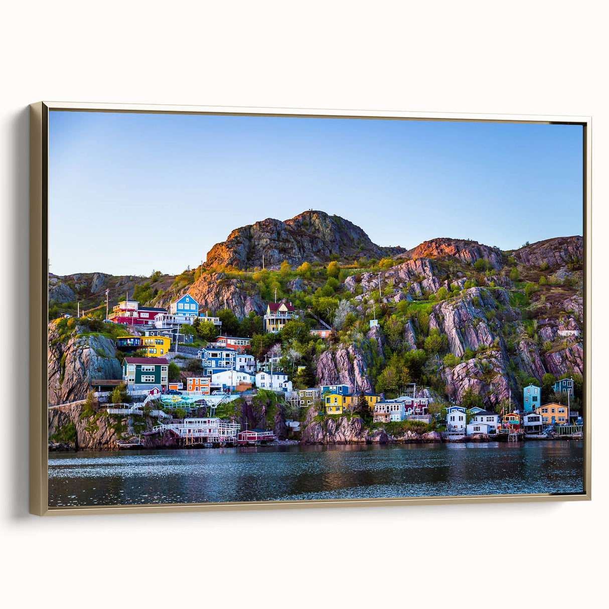 Framed canvas landscape painting of Newfoundland, featuring muted earth tones and vintage poster style.
