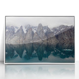 Art deco poster of Northwest Territories scenery in muted blue and white tones, framed acrylic.