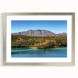 Textured abstract art print of Yukon scenery in silver frame, ideal for bedroom wall decor.