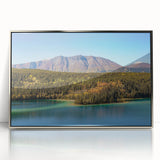 Mid-century modernist art of Yukon scenery in silver-framed acrylic, featuring muted earth tones, ideal for nursery wall art.