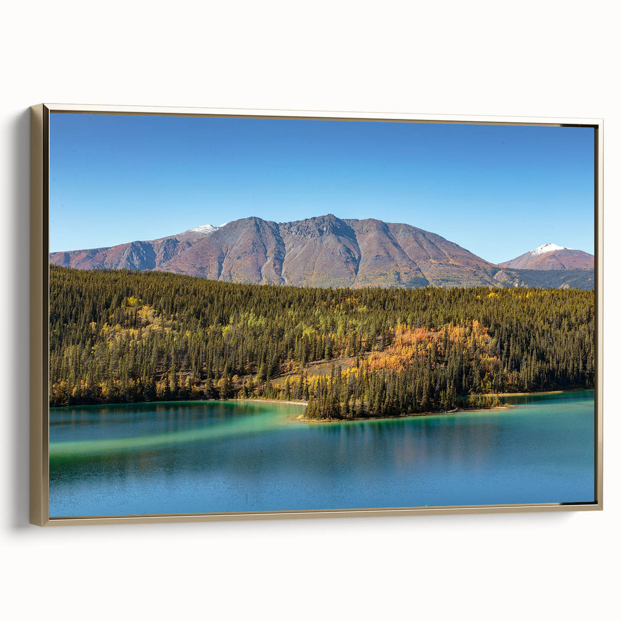 Framed canvas depicting a vintage-style Yukon landscape in muted gold and black tones, ideal for bedroom wall art.
