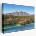 Side view of a stretched canvas depicting a serene Yukon landscape in muted earth tones, ideal for kitchen wall art.